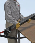 Person using MB48B 48 Inch Pan Style Mini Brake for 22 gauge galvanized steel on workbench, single person setup