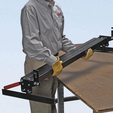 Person using MB48B 48 Inch Pan Style Mini Brake for 22 gauge galvanized steel on workbench, single person setup