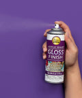 Hand holding Spray Gloss Finish Acrylic Sealer 6 Oz Clear Coat for DIY Indoor and Outdoor Projects, durable protective gloss can