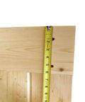 Close-up of Unfinished Interior Barn Door Slab DIY Kit With Solid Pine Core, 83.5 Inches Tall By 30 Inches Wide, Knotty Pine Finish.
