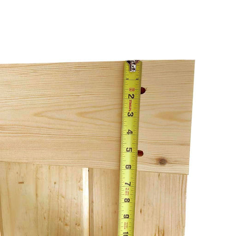 Close-up of Unfinished Interior Barn Door Slab DIY Kit With Solid Pine Core, 83.5 Inches Tall By 30 Inches Wide, Knotty Pine Finish.