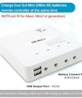 6 In 1 Battery Charger For DJI Mini 4K Mini 2 Mini SE Mini 2 SE Drones Rapid Parallel Charging Hub Powers Four Batteries And Remote Control Station For Quick Power Up Not For Mavic Mini Gen 1, shown with ports and labels, white color charger.
