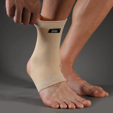Person wearing Ankle Brace Compression Sleeve 2 Pack For Men And Women Breathable Ankle Support Foot Compression Sock For Swelling Plantar Fasciitis And Sprains All Day Comfort No Slip Grip