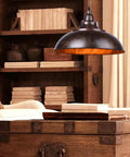 Industrial Nautical Barn Pendant Light With Rustic Bowl Shape Ceiling Fixture On Chain, ideal for kitchen cafe bar restaurant, 16.6 inch wide, rust finish, UL listed loft pendant lamp above a wooden table.