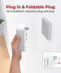 Dead Simple Plug In Carbon Monoxide Detector With 10 Year Battery Backup Ironclad Wall Outlet Monitoring, shown being held for plug-in.