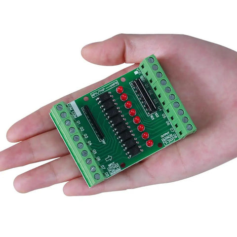 Person holding 8 Channel Optocoupler Isolation Board For DC 3.3V To 5V Inputs, NPN PNP High Low Level Output, Signal Converter