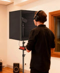 Person using Pro Grade Microphone Isolation Shield for Studio With Tripod Stand Adjustable Height Up To 53.1 Inches in home studio