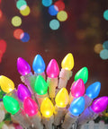 Easter LED String Lights 50 Count Glass C3 Bulbs Multi Color Pastel 120V on white wire with colorful background