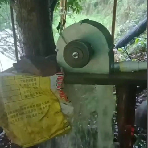 Two Kilowatt Micro Hydro Generator For Home Use With 110V And 220V Output High Efficiency Portable Water Turbine installed outdoors
