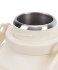 Close-up of the stainless steel rim of the Portable Electric Water Boiler Kettle Slick One Liter, highlighting quality design.