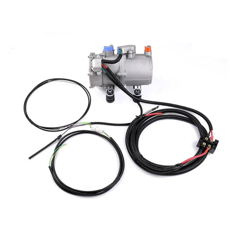 Direct Wire Electric AC Compressor Beats Sweltering Road Heat All Day Long With Simple Plug And Play Climate Control For Trucks Campers And Heavy Duty Rigs, featuring aluminum casing and wiring harness.