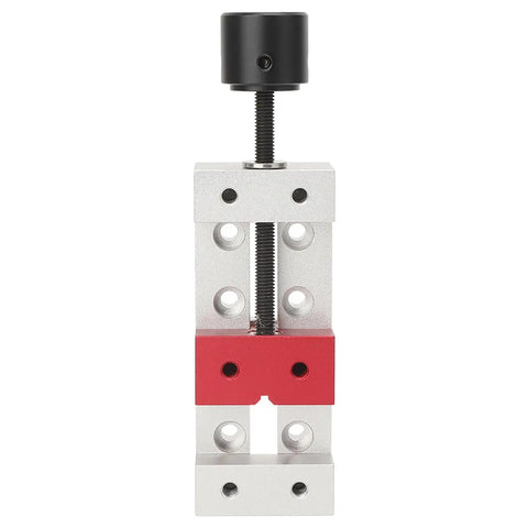 Slick Compact Mini Vise With 50mm Jaw Space, red and silver metal design for clamping small materials securely.