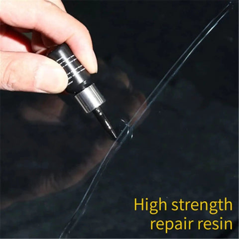 Hand applying Windshield Crack Repair Kit With Repair Fluid For A Quick DIY Fix And Car Care Easy To Use Anti Scratch Formula on glass