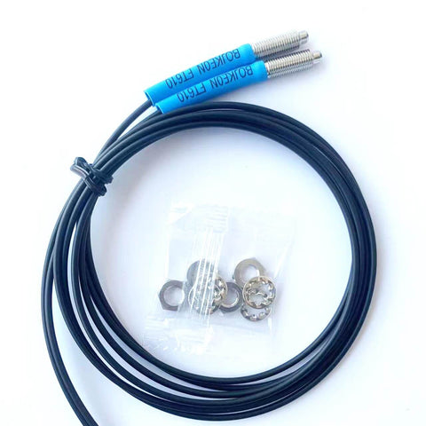 FT610 Diffuse Reflective Optical Fiber Sensor with 1M line, 2mm outer diameter, and M6 probe, shown with accessories.