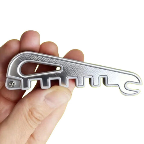 Eyeglass Frame Calibration Tool With Multidirectional Slots And Ergonomic Non Slip Grip For Precise Alignment And Nose Pad Adjustment