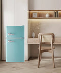 Hella Spacious 3.5 Cubic Feet Retro Mini Fridge With Handle Compact Refrigerator in blue against wooden desk and chair.