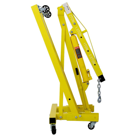 Side view of Big Iron Two Ton Folding Engine Hoist With Six Swivel Casters That Roll Like Butter For Stress Free Shop Moves And Quick Hydraulic Lifts Of Car Engines Or Truck Blocks Yellow.