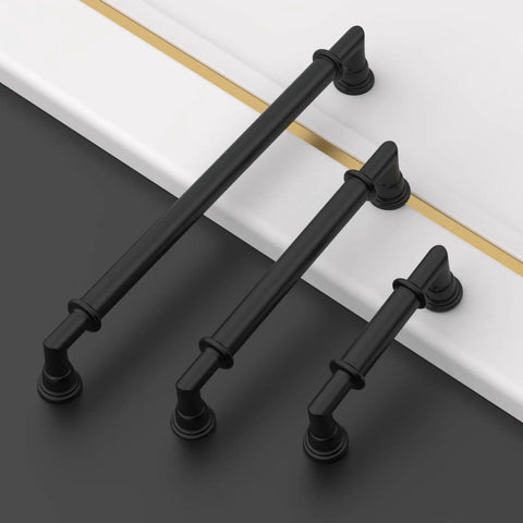 Six Pack 5 Inch Matte Black Cabinet Handles for kitchen cabinets in modern satin black finish on black and white surface.