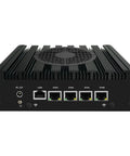Kickbutt Compact Mini PC Fueled By The Versatile Amd Ryzen R2314 Chipset showing rear panel with four 2.5G Ethernet ports and cooling fins.