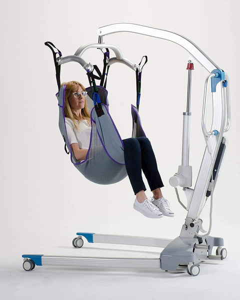 The Ultimate Patient Aid Full Body Mesh Sling For Safe And Effortless Bed To Wheelchair Transfers With Reinforced Straps supporting a user in a lifting device.