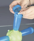 Filling treat tube of Windmill Strategy Dog Puzzle Toy For Beginners Level 1 Treat Puzzle Interactive Foraging Activity.