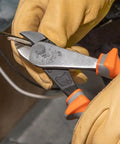 Gloved hand using 1000V Insulated Diagonal Cutting Pliers 8 Inch With High Leverage Design And Induction Hardened Blades Made In USA Pro Grade Electrician Tools For Safe Work Thick Grip Handles ASTM F1505-16 IEC 60900 Rated cutting a wire