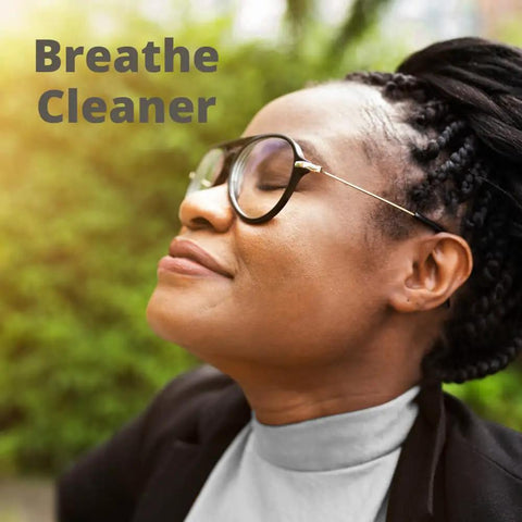 Person enjoying fresh air outdoors, promoting Pleated Replacement Air Filter for AC and Furnace 21.5 by 23.5 Inches Pack of 4 MERV 8