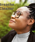 A woman enjoying fresh air outdoors with the text 'Breathe Cleaner', illustrating the effect of Easy Fit Pleated Air Filter 18x24x1 17.75x23.75 MERV 8 Pack.