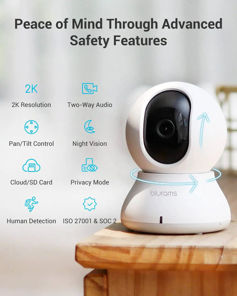 2K Indoor Security Camera System With 360 Degree Coverage, Smart Baby Monitor And Pet Camera For Home Surveillance on table.