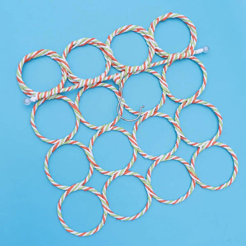 Foldable Paper Rattan Scarf Hanger Featuring 20 Rings And Sturdy Steel Hook, colorful woven loops on blue background.
