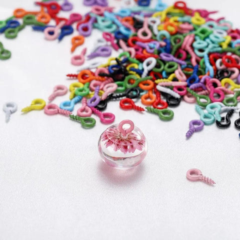 Grab These Dope Colorful Screw Eye Pins For Your Next DIY Jewelry Crafter Featuring Solid Metal Build And Rust Proof Coating In Mixed 1Mm 4Mm 8Mm Dimensions with colorful eye pins and a charm.