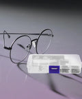 Ultimate Eyeglass Repair Kit Featuring Replaceable Nose Pads And Micro Screwdriver With Assorted Glasses Screws Compact Tool beside glasses.