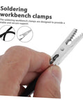 Close-up of soldering workbench clamp from Six Piece Flexible Third Hand Soldering Tool Set With Adjustable Arms PCB Holder And Magnifying Lamp