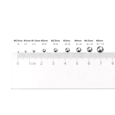 Tough As Nails 1 mm Bearing Balls Built From Slick 304 Stainless Steel G 100 Precision Grade 5000 Piece Drop Box shown with measuring ruler.