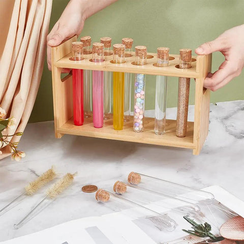 Wooden Test Tube Rack Kit With 12 Hole Holder And 12 Glass Tubes With Cork Stoppers 2 Tube Brushes And Corks Ten Point Four By Three Point Nine By Six Point Seven Inch Lab Gear For Chemistry Experiments And Science Class displayed on a table