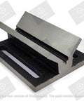 V Block Jig Fixture for center drilling, solid iron, precision machined surfaces, visible in solid unbreakable construction.