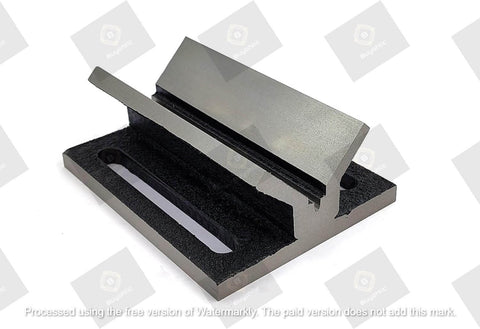 V Block Jig Fixture for center drilling, solid iron, precision machined surfaces, visible in solid unbreakable construction.