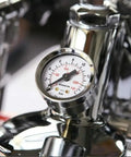 Pressure gauge of Giotto Dual Boiler Espresso And Cappuccino Machine With PID Temperature Control, close-up view.