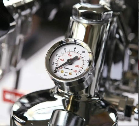 Pressure gauge of Giotto Dual Boiler Espresso And Cappuccino Machine With PID Temperature Control, close-up view.
