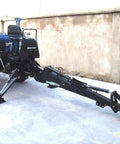 Backhoe Attachment For Tractors With 3 Point Hitch Cat 1 PTO 15 Inch Bucket attached to blue tractor, ready for use.