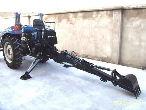 Backhoe Attachment For Tractors With 3 Point Hitch Cat 1 PTO 15 Inch Bucket attached to blue tractor, ready for use.