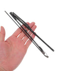 Heavy Duty Folding Umbrella Repair Kit Featuring Slick 8 Bone Metal Ribs held in hand showing black metal ribs for quick fixes.