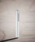 Shift Square Two Function Handshower With 1.75 GPM Flow Polished Chrome Finish on marble surface