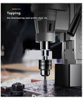 Close-up of Pro Grade Magnetic Drill Press Variable Speed Bench Drilling Machine Built Like A Tank For Wood And Metal Projects No Sweat Setup DIY Home Shop Essential Gear With Quick Focus Knob For Precision Work Every Single Time, showing tapping feature.