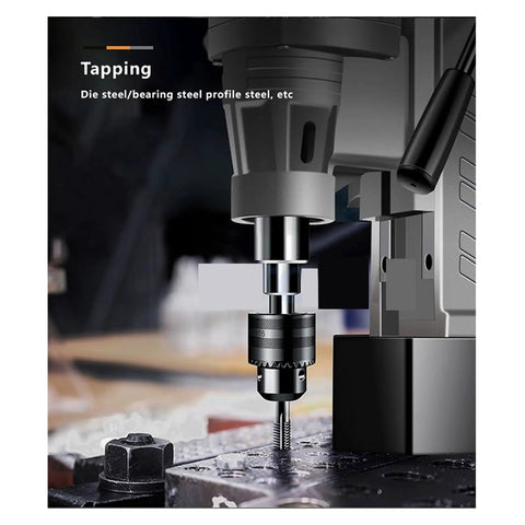 Close-up of Pro Grade Magnetic Drill Press Variable Speed Bench Drilling Machine Built Like A Tank For Wood And Metal Projects No Sweat Setup DIY Home Shop Essential Gear With Quick Focus Knob For Precision Work Every Single Time, showing tapping feature.