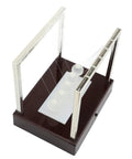 Classic Desk Pendulum Toy With Stable Base Cradle Science Gadget for energy transfer, featuring glass balls and wooden frame.