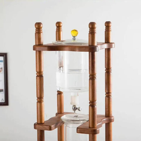 Badass Cold Brew Drip Tower Holds 25 Cups With Solid Wood Base, Slow Drip Ice Coffee Maker with transparent water chamber.