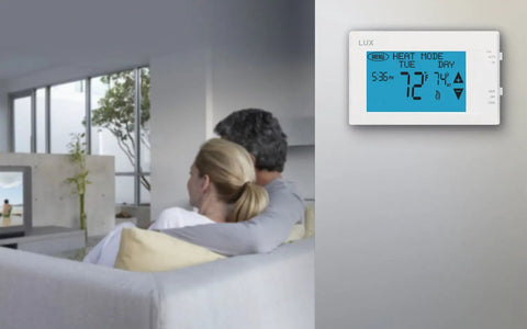 Living room with Programmable Large Touchscreen Thermostat For Home Comfort And Cooling, Easy To Read Display, White on wall.