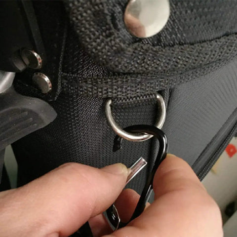 Attaching Tiger Pack Of 2 Golf Club Brush Groove Cleaner With Retractable Zip Line And Aluminum Carabiner to a golf bag