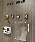Colorful Disney character hooks with a to-do list board in a modern home setting, featuring Mickey Mouse decor.